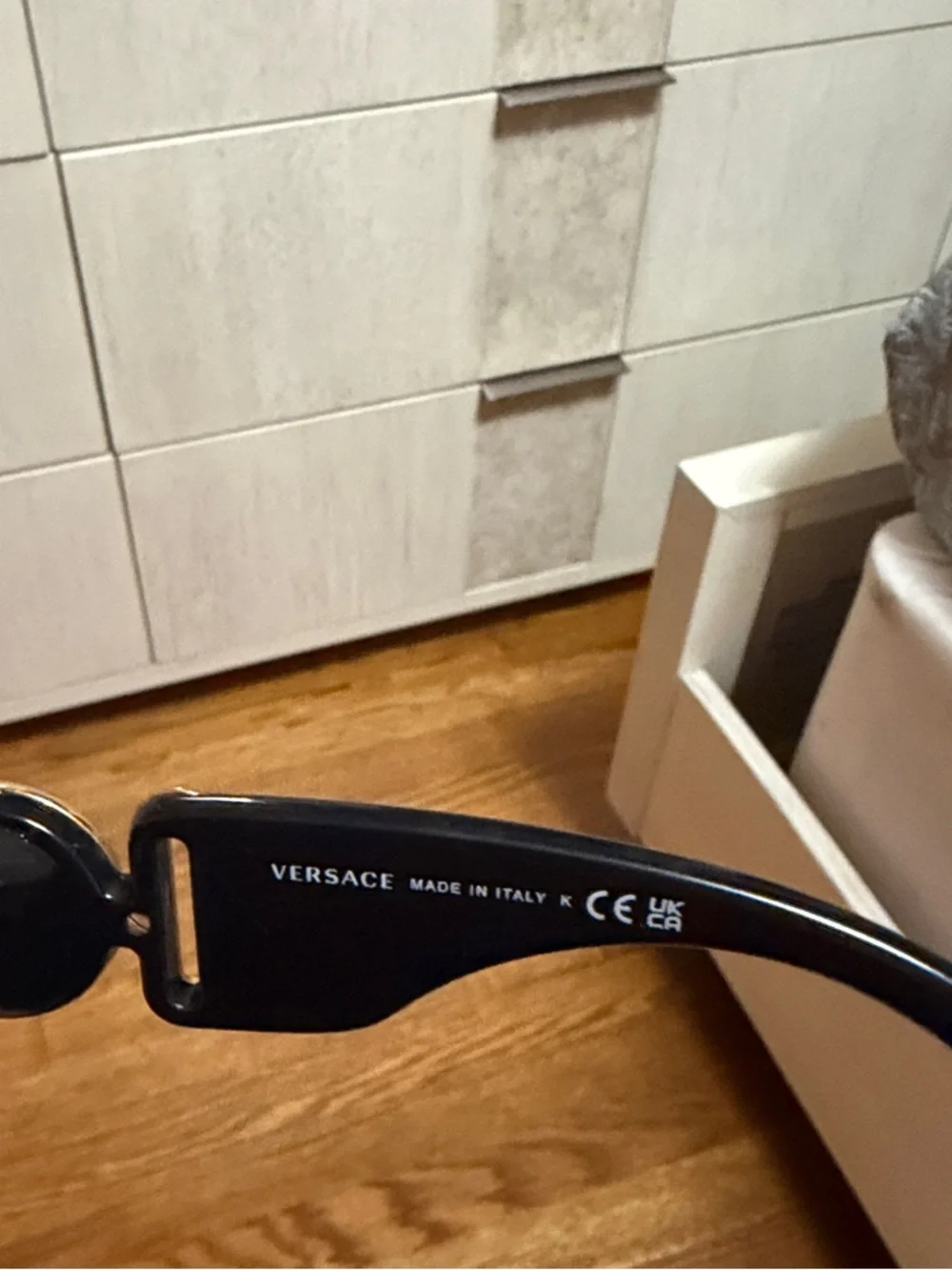 Black Women's Sunglasses with Gold Medallion Accent